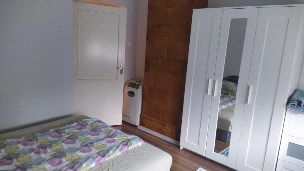 Postel nebo postele na pokoji v ubytování Tulipán Vendégház