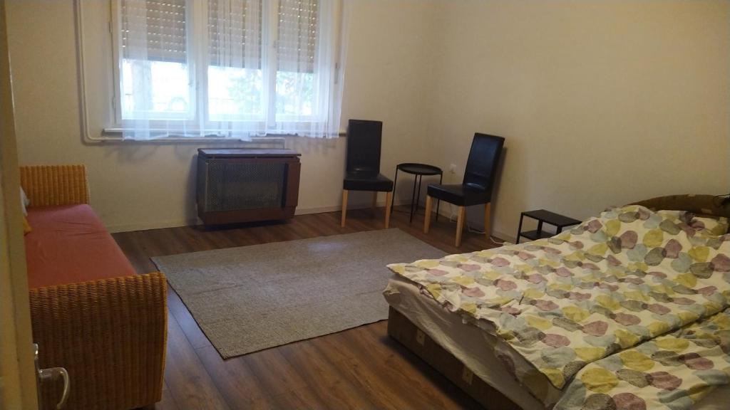 Postel nebo postele na pokoji v ubytování Tulipán Vendégház