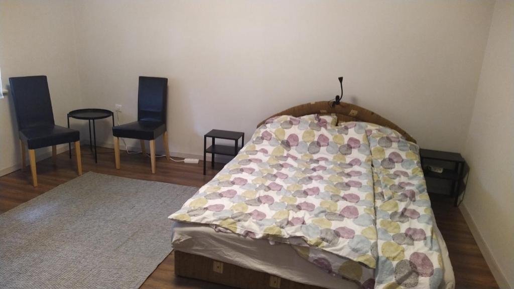 Postel nebo postele na pokoji v ubytování Tulipán Vendégház