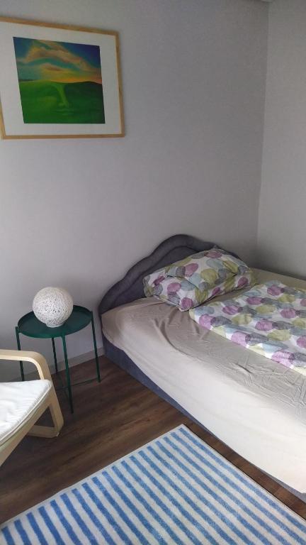 Postel nebo postele na pokoji v ubytování Tulipán Vendégház