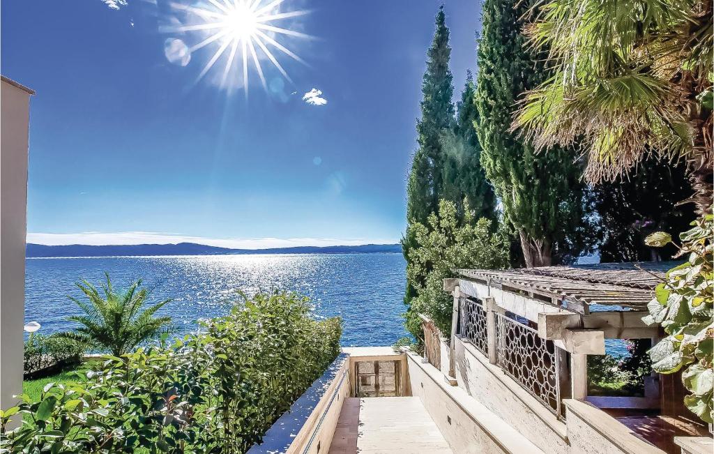 a view of the lake from a house at Beautiful Apartment In Crikvenica With Wifi in Crikvenica