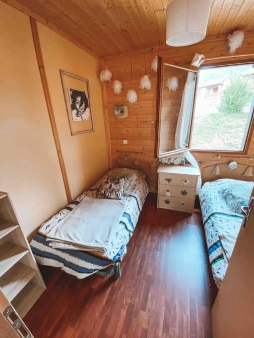 Postel nebo postele na pokoji v ubytování Chalet cosy Ignaux - Ax les thermes