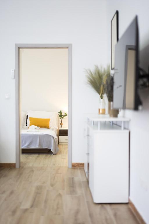 Posteľ alebo postele v izbe v ubytovaní Mathilda's apartment