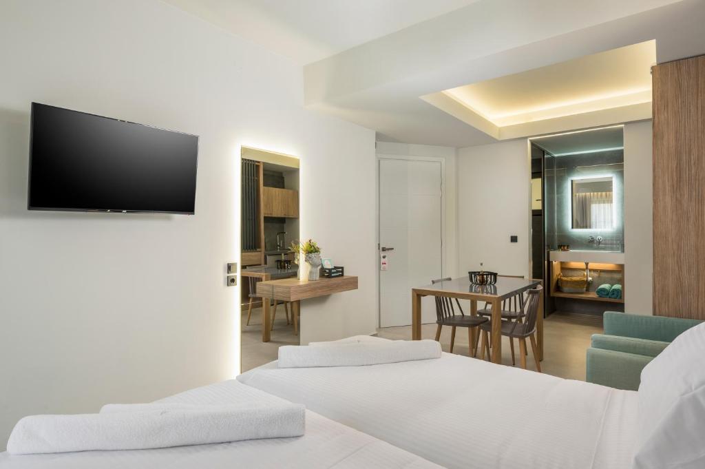 Postel nebo postele na pokoji v ubytování Alkionides Seaside Hotel