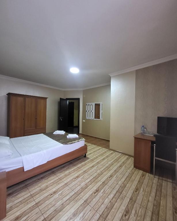 Postel nebo postele na pokoji v ubytování Hotel Elio