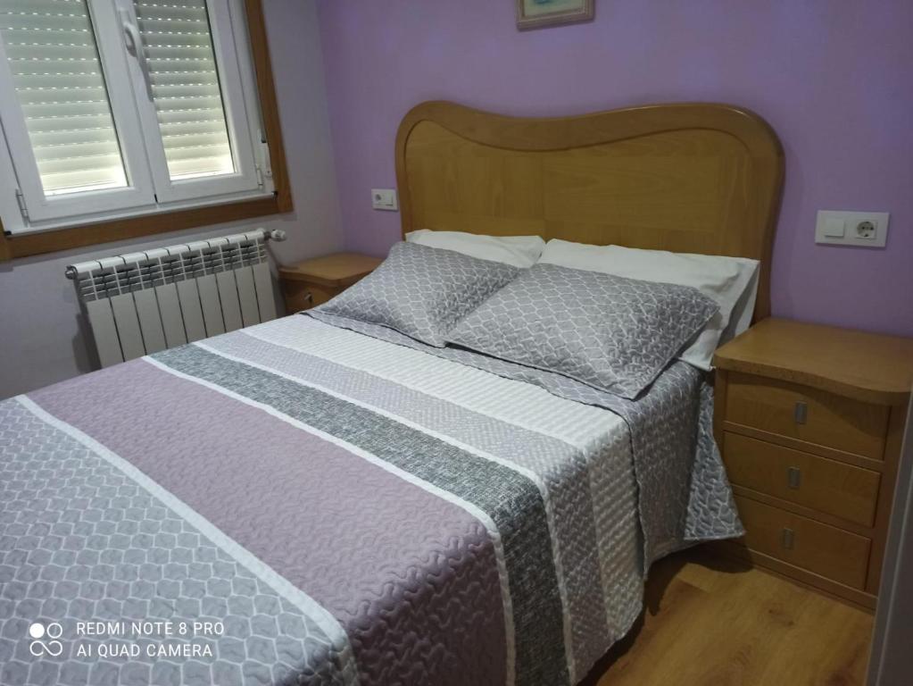 Postel nebo postele na pokoji v ubytování Aroalia, super céntrico!!