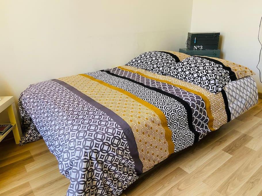 Łóżko lub łóżka w pokoju w obiekcie Villa Yvonne M&M à 50m de la plage