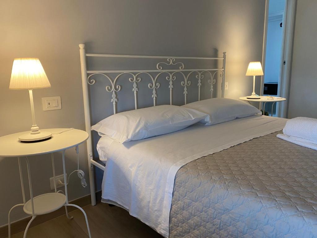 Postel nebo postele na pokoji v ubytování Borgo Incoronata B&B