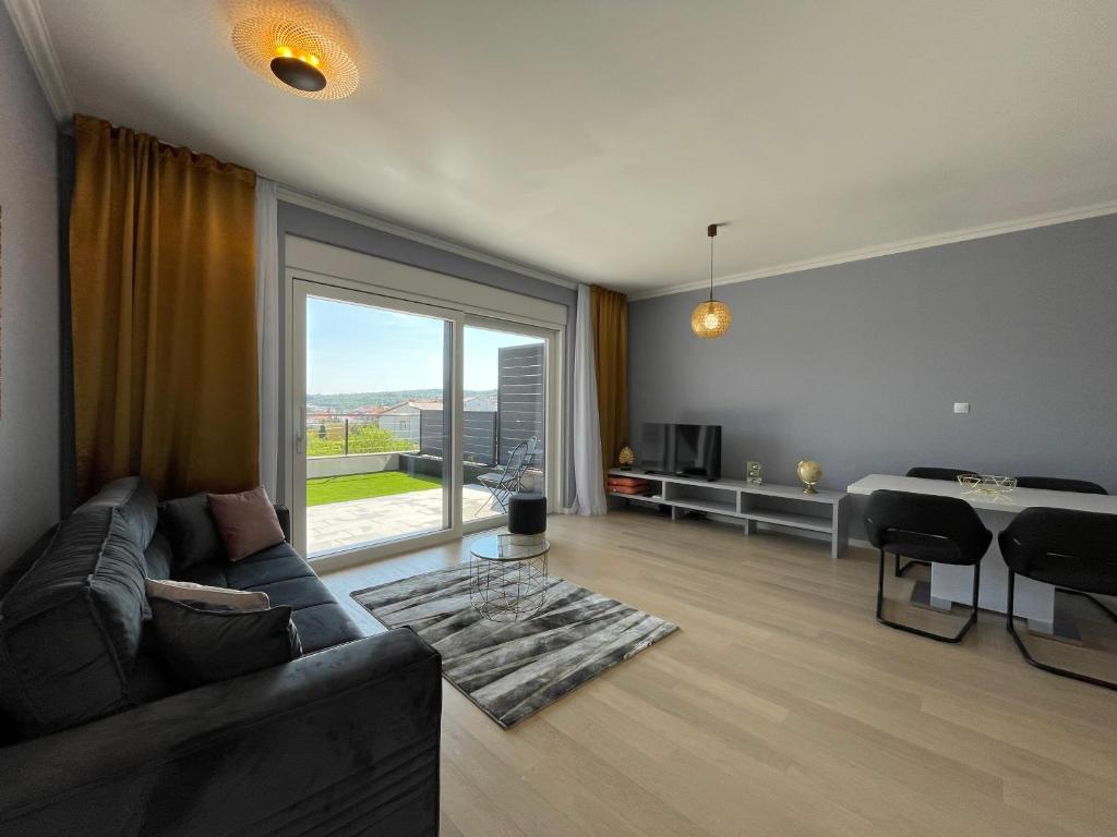 Posezení v ubytování Lux Nanea Apartment