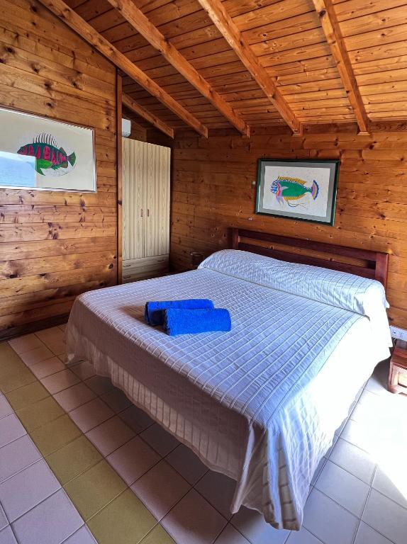 Postel nebo postele na pokoji v ubytování Aeneas' Landing Resort