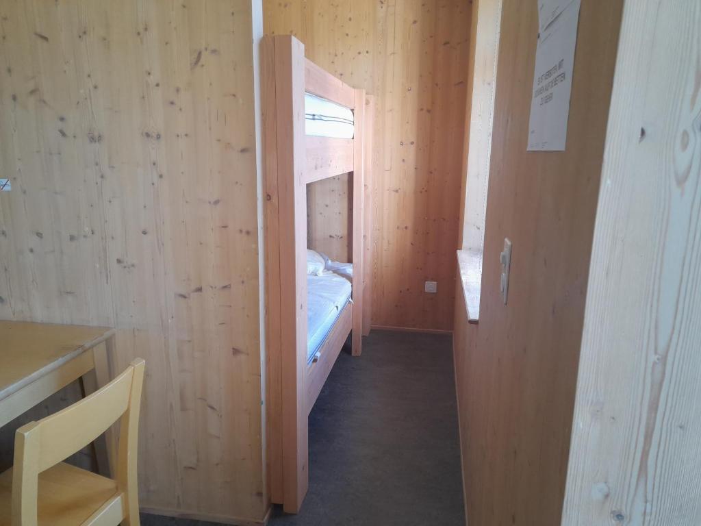 Postel nebo postele na pokoji v ubytování Ostello Santa Maria 6541 Santa Maria