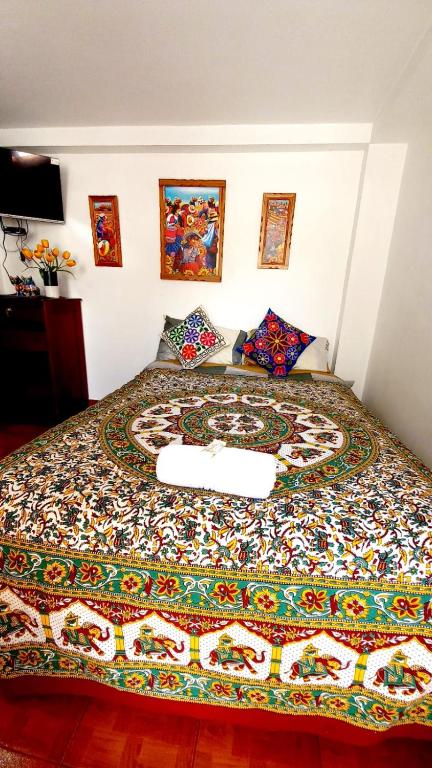 Una cama o camas en una habitación de Hostel mágico San Blas