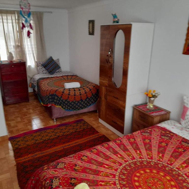 Una cama o camas en una habitación de Hostel mágico San Blas