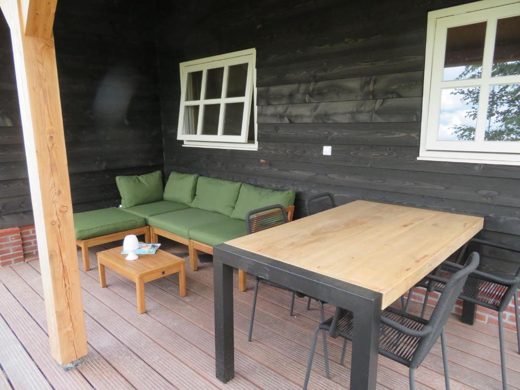 Posezení v ubytování Singelstate het Tuinhuis