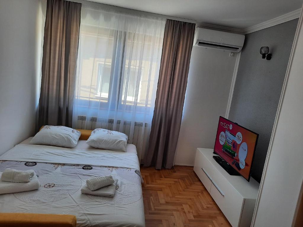 Postel nebo postele na pokoji v ubytování Apartment Denza City Center Sarajevo