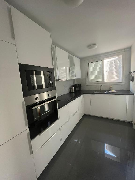 Kuchyň nebo kuchyňský kout v ubytování Ocean Romance (Duplex)
