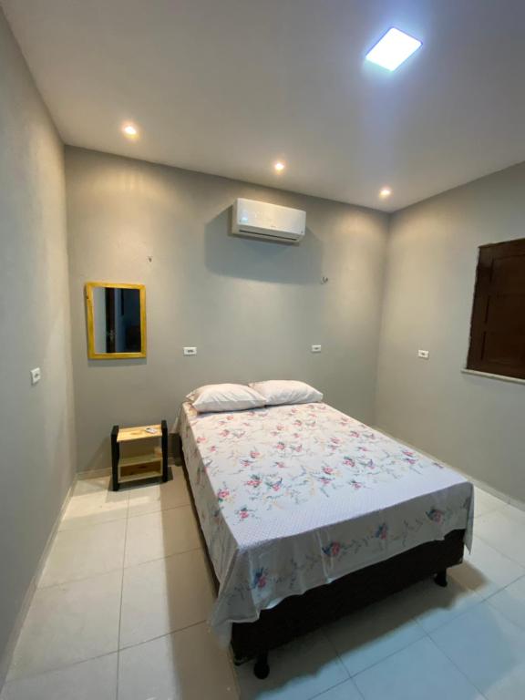Giường trong phòng chung tại Casa Mar é Vida