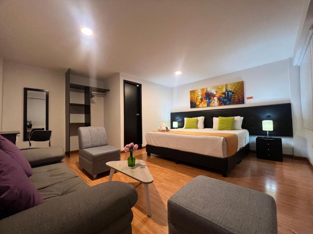 Postel nebo postele na pokoji v ubytování Hotel Ferias Park