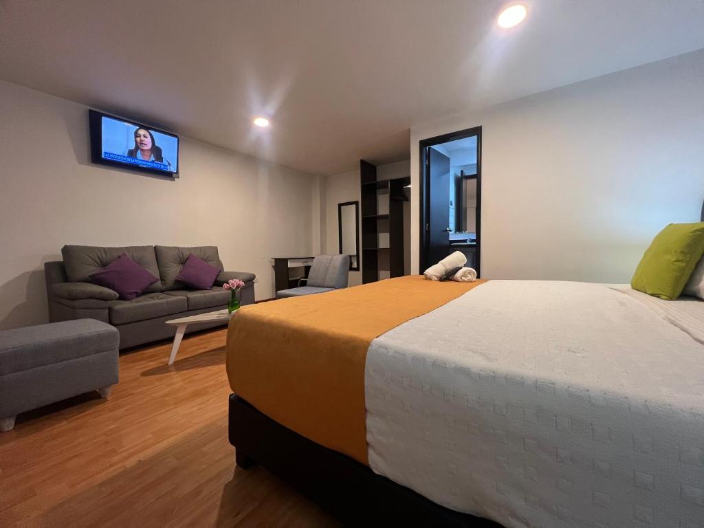 TV a/nebo společenská místnost v ubytování Hotel Ferias Park