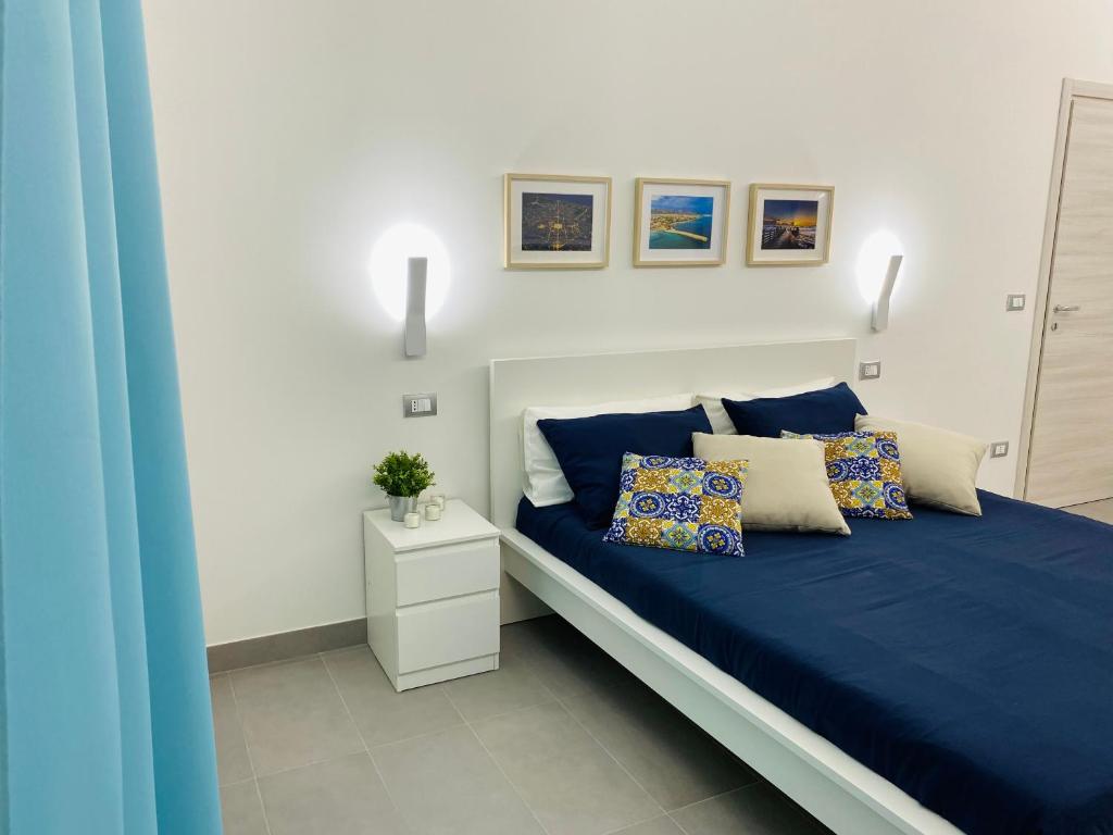 Postel nebo postele na pokoji v ubytování Sicilian Rooms
