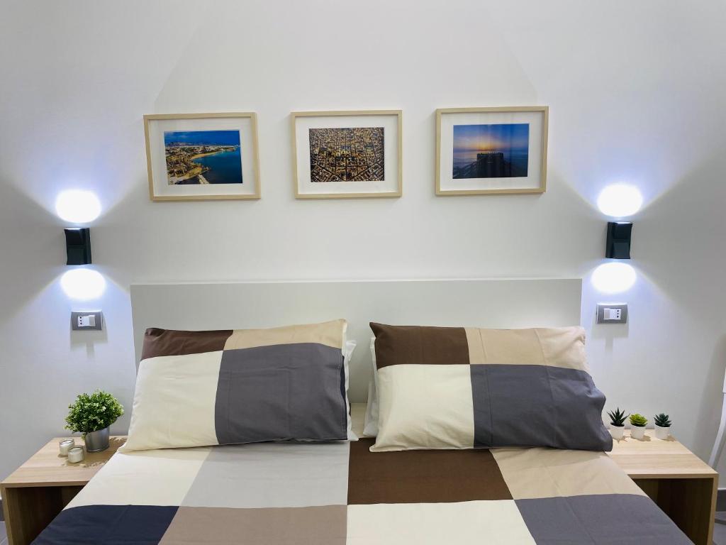 Postel nebo postele na pokoji v ubytování Sicilian Rooms