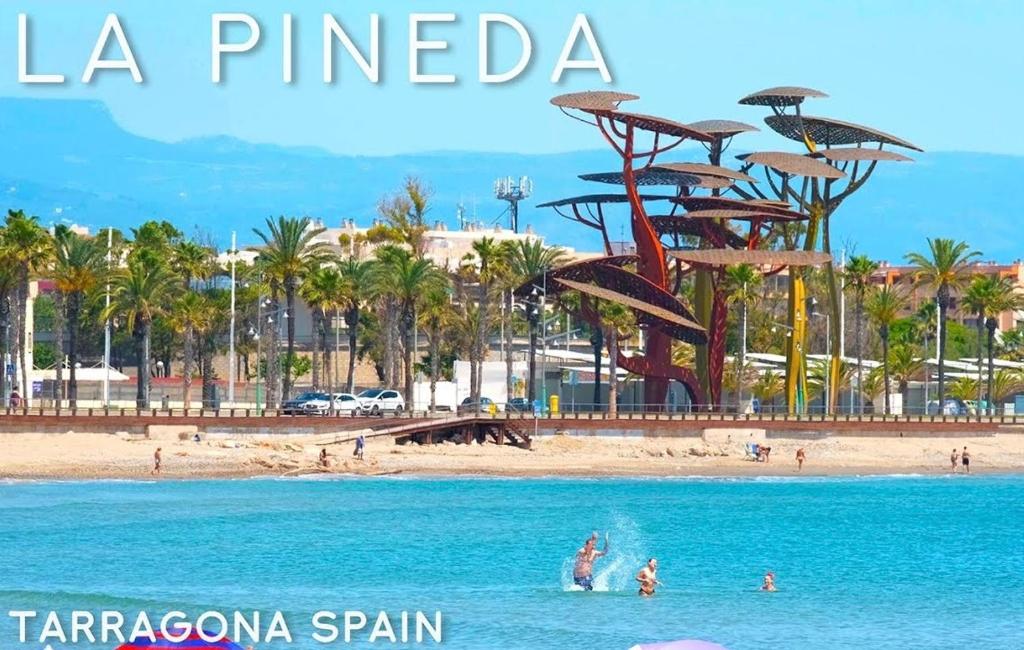 a view of a beach in la pineda at La Pineda playa in La Pineda