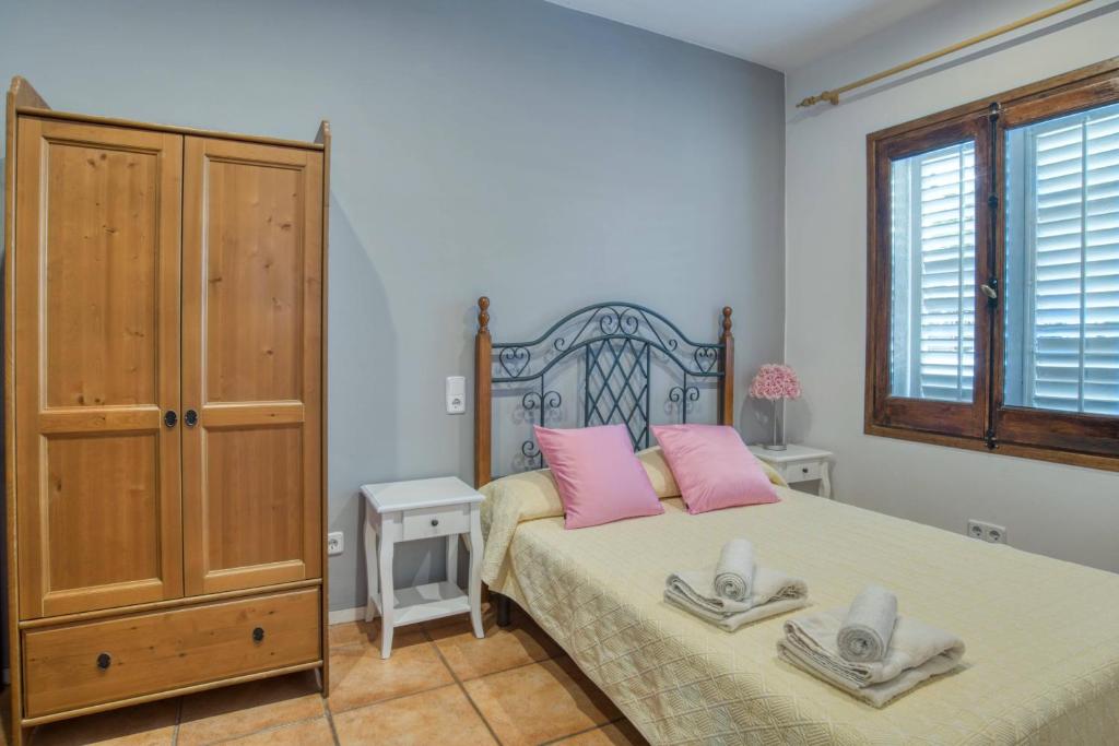 Postel nebo postele na pokoji v ubytování Casa Isabel
