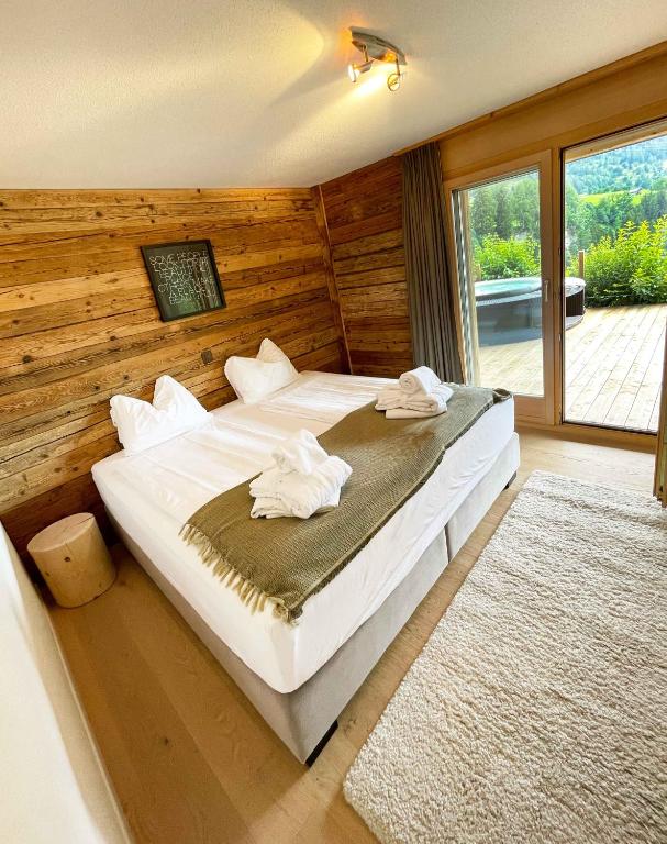 Postel nebo postele na pokoji v ubytování WOO® Loft Resort