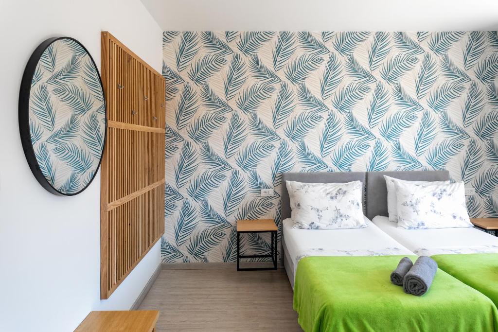 Postel nebo postele na pokoji v ubytování Hostel Villa Skansi