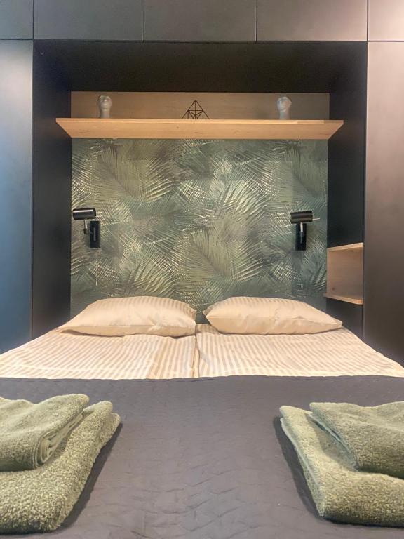 Ένα ή περισσότερα κρεβάτια σε δωμάτιο στο Loft 22 DELUX