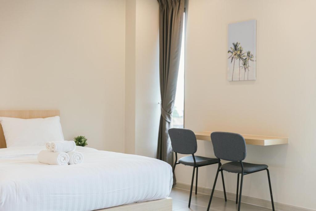 Postel nebo postele na pokoji v ubytování Good nine Hotel