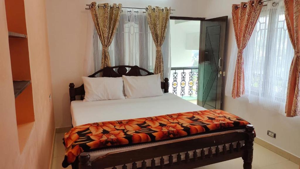 Postel nebo postele na pokoji v ubytování Royal Serene Villas