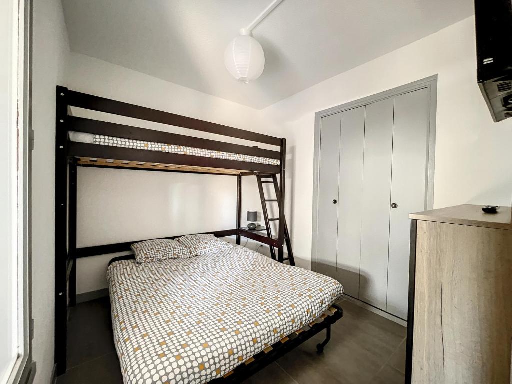 Posteľ alebo postele v izbe v ubytovaní Appartement rénové tout confort avec piscine