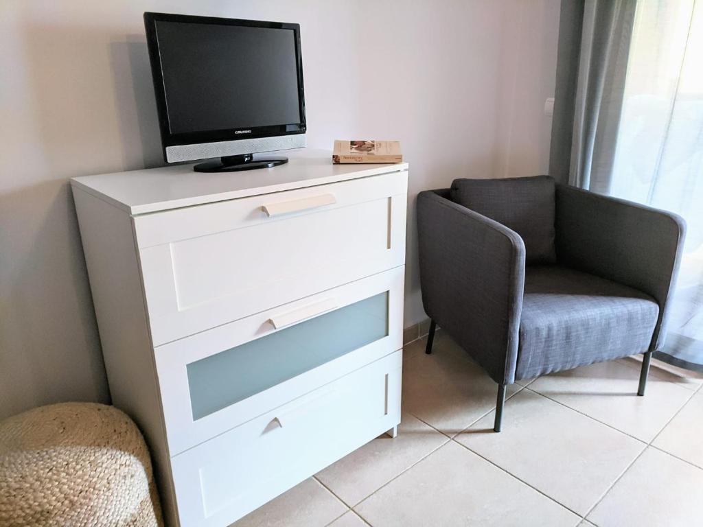 Televízia a/alebo spoločenská miestnosť v ubytovaní Espacioso apartamento de 2 dormitorios