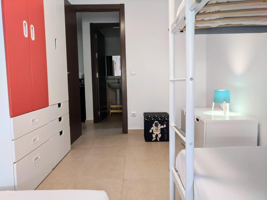 Posteľ alebo postele v izbe v ubytovaní Espacioso apartamento de 2 dormitorios