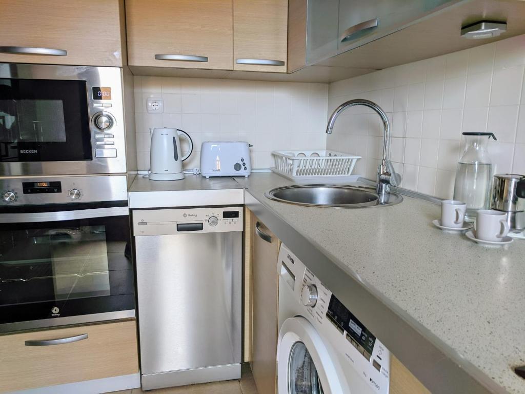 Kuchyňa alebo kuchynka v ubytovaní Espacioso apartamento de 2 dormitorios