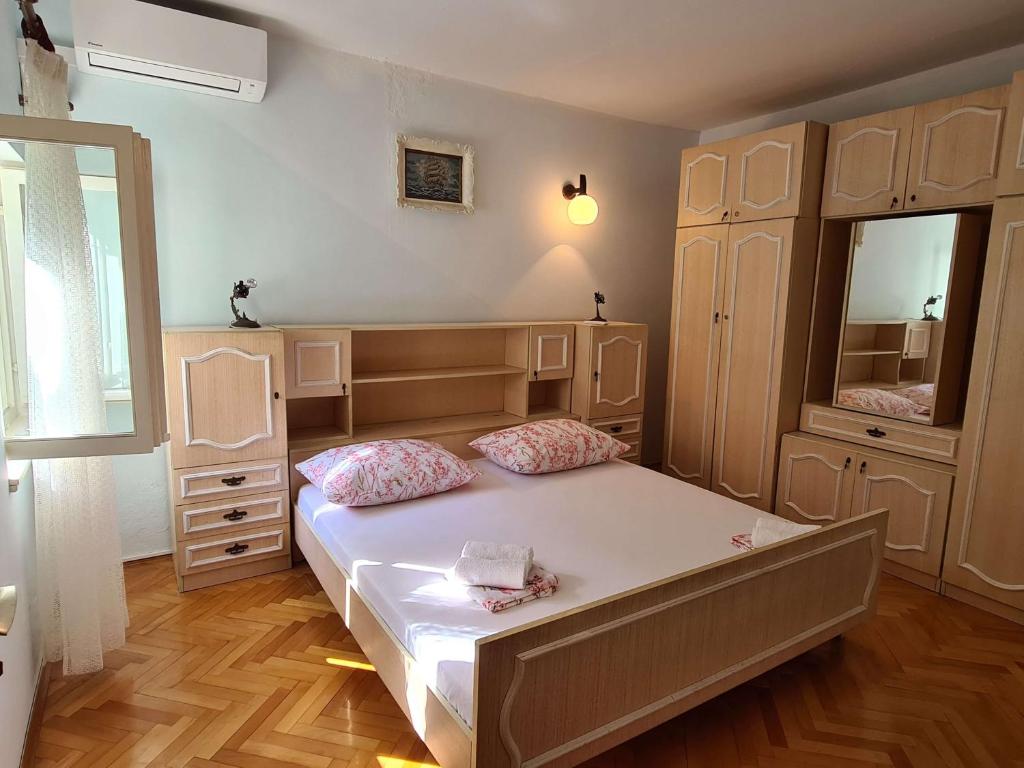 Posteľ alebo postele v izbe v ubytovaní Apartments Vinea