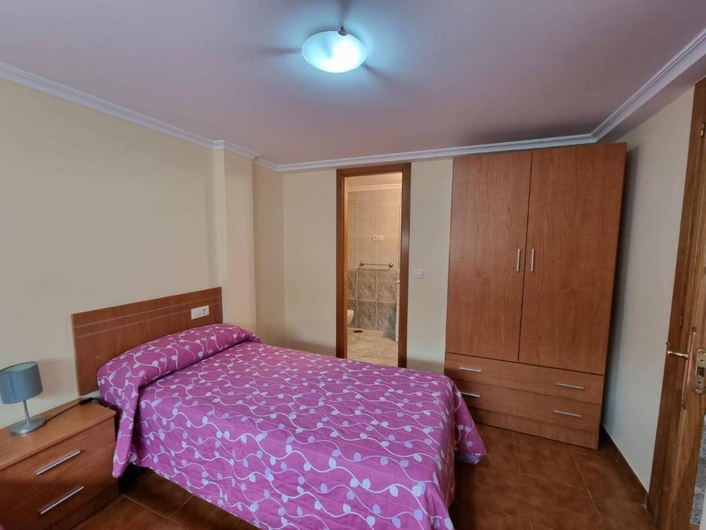 Postel nebo postele na pokoji v ubytování Apartamento en Playa Rapadoira