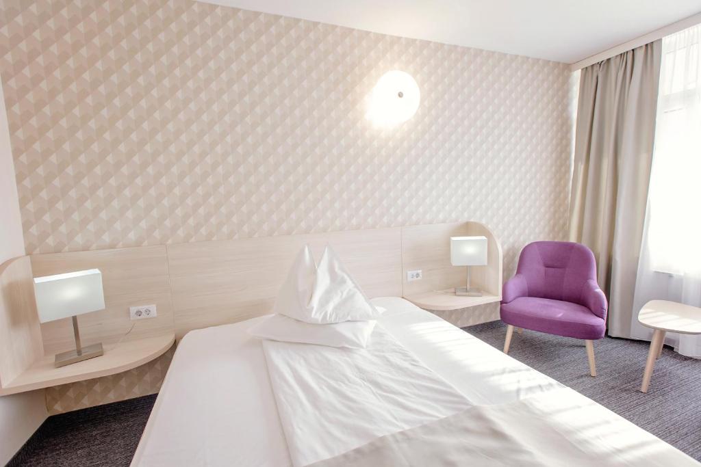 Postel nebo postele na pokoji v ubytování Hotel Termal