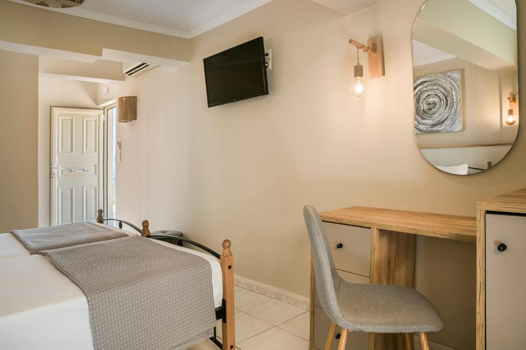 Postel nebo postele na pokoji v ubytování Irilena Hotel