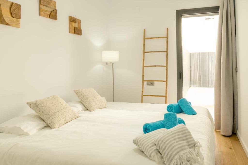 Postel nebo postele na pokoji v ubytování The Links Alcaidesa apartment