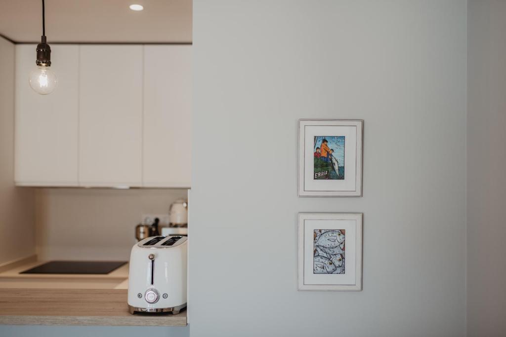 Kuchyň nebo kuchyňský kout v ubytování Petit Luxe Volta Apartaments