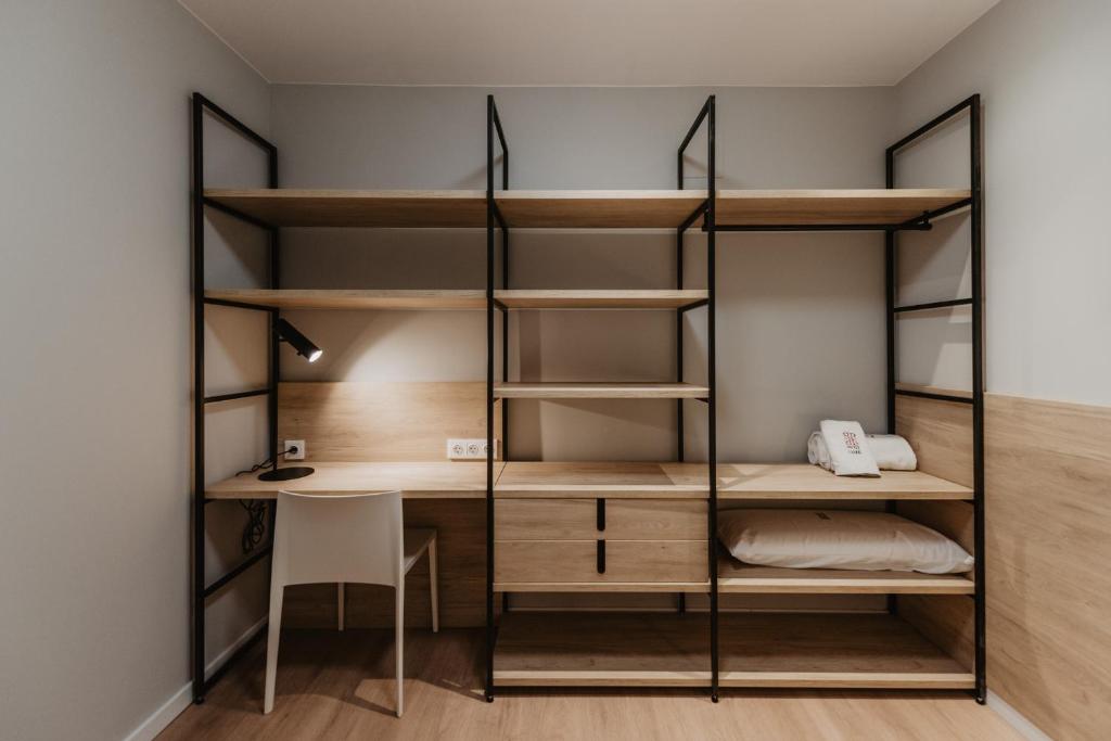 Postel nebo postele na pokoji v ubytování Petit Luxe Volta Apartaments