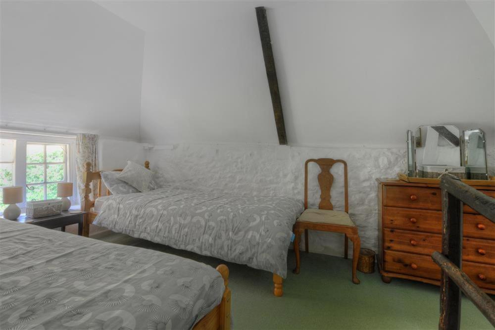 Postel nebo postele na pokoji v ubytování St Gabriels Cottage