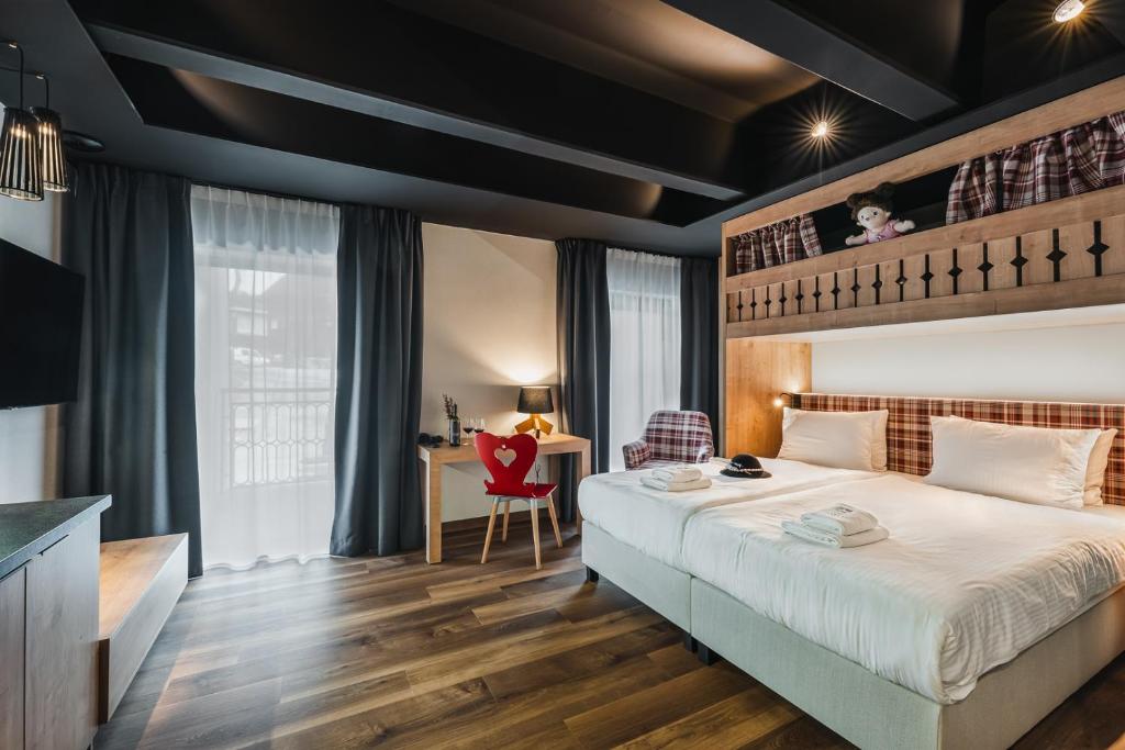 Ein Bett oder Betten in einem Zimmer der Unterkunft Szczawnica Park Resort & Spa