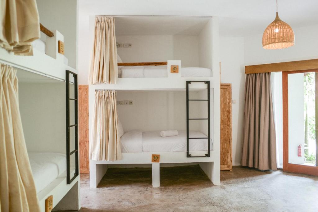 Voodi või voodid majutusasutuse Mana Eco Retreat toas