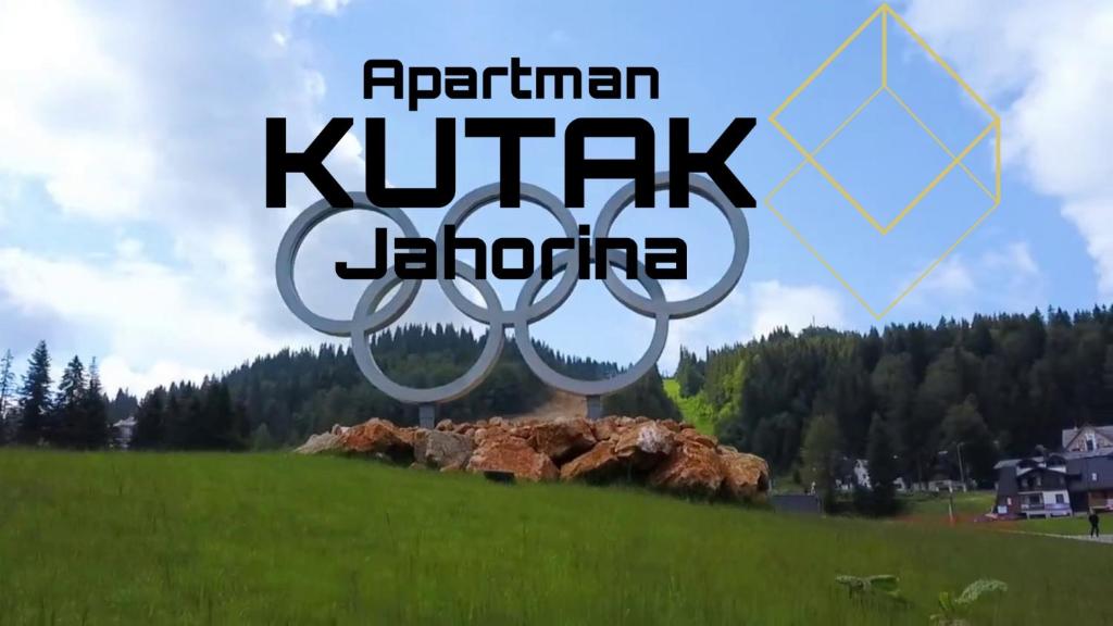 a sign that reads perform kirk jordore in a field at Apartman KUTAK Jahorina in Jahorina