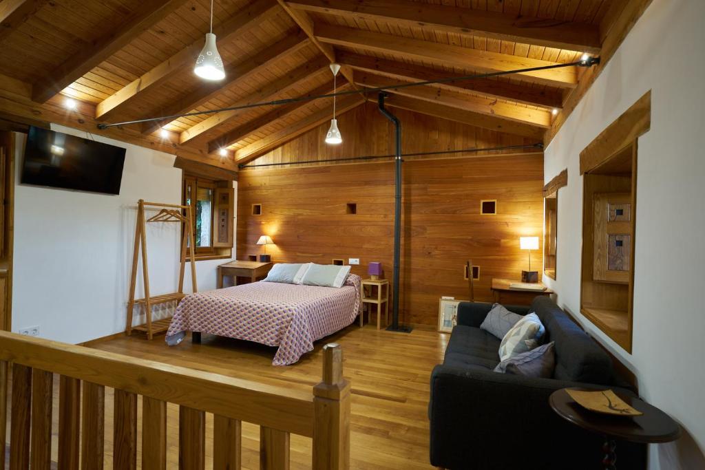 Postel nebo postele na pokoji v ubytování Casa Rural Caenia Parejas