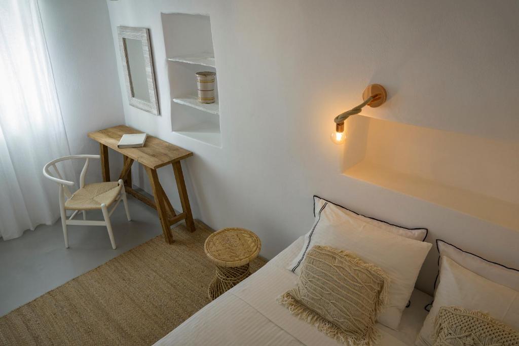 Voodi või voodid majutusasutuse Makarias Traditional Luxury Villas toas