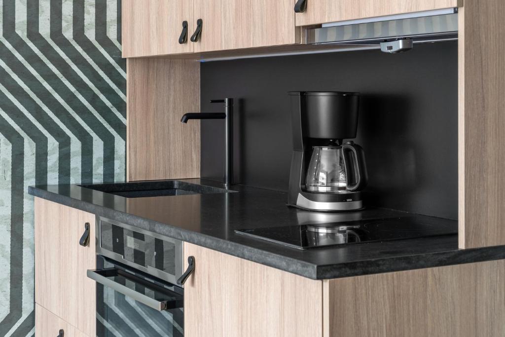 Kuchyň nebo kuchyňský kout v ubytování Bjørvika Apartments - Sirkus Renaa